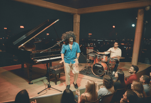 Gabriel and his band performing for an audience